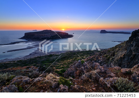 Beautiful sunset view of Cape Tigani and Gramvousa islet from Balos beach, Crete, Greece. 71225453