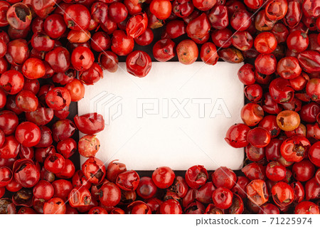 Mockup square sheet of paper with redpeppercorns Mockup square sheet of paper with redpeppercorns 71225974