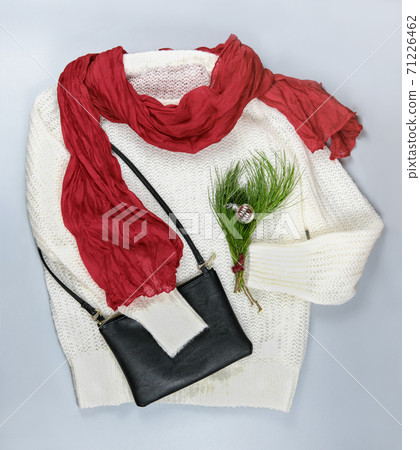 holidays apparel. christmas outfit. white sweater with red scarf 71226462