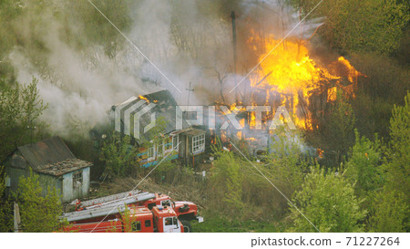 Fire in the house, fire trucks on fire Fire in the house, fire trucks on fire 71227264