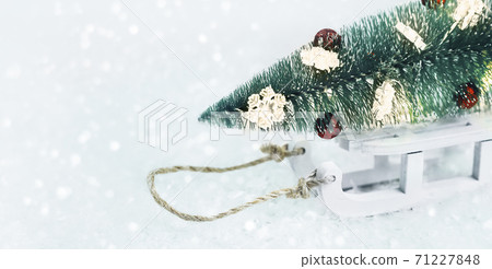 Christmas tree with toys on a sleigh on snow card. Christmas tree with toys on a sleigh on snow card. 71227848