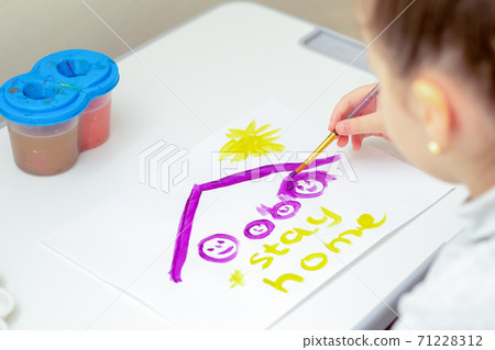 Child draws family under roof. Child draws family under roof. 71228312