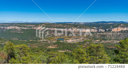 Cuenca mountain range under clear blue sky over the horizon Cuenca mountain range under clear blue sky over the horizon 71228460