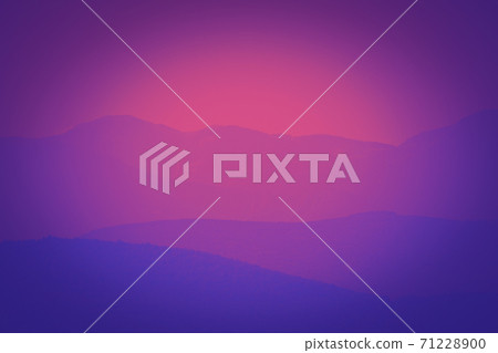Vibrant and colorful purple sunset with silhouette of mountain 71228900
