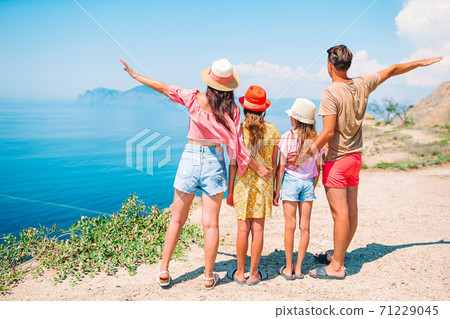 Happy family on vacation in the mountains Happy family on vacation in the mountains 71229045