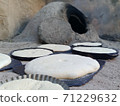 Clay oven with bread tidbit Clay oven with bread tidbit 71229632