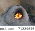 image Clay oven with fire image Clay oven with fire 71229636