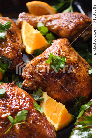 Fried chicken with oranges 71230388