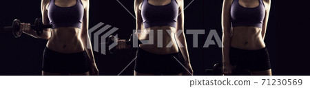 Slim athletic woman Holding dumbbell in the hand on black Slim athletic woman Holding dumbbell in the hand on black 71230569