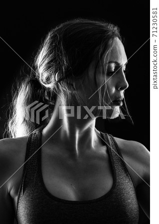 Slim sexy athletic woman on black background Slim sexy athletic woman on black background 71230581