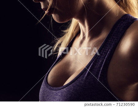 Slim beauty athletic woman on black background Slim beauty athletic woman on black background 71230590
