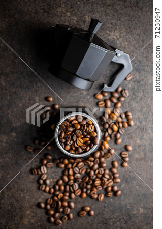 Coffee beans and bialetti coffee maker. Moka pot Coffee beans and bialetti coffee maker. Moka pot 71230947