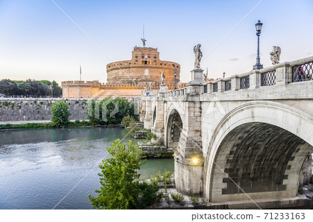 The bridge over the Tiber river and Castel Sant Angelo in Rome in the evening The bridge over the Tiber river and Castel Sant Angelo in Rome in the evening 71233163