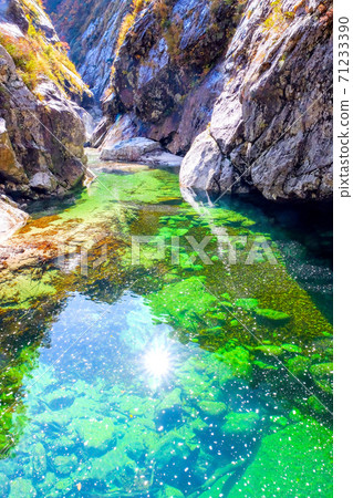 Blue Isawa River and V-shaped valley (vertical) Blue Isawa River and V-shaped valley (vertical) 71233390