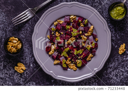 Beetroot, pesto sauce and walnut salad Beetroot, pesto sauce and walnut salad 71233448