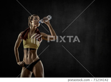 young fitness woman with bottle water young fitness woman with bottle water 71234142