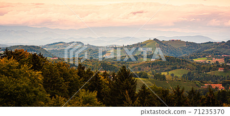 South styria vineyards landscape, Tuscany of Austria. Sunrise in autumn. 71235370