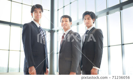 Three businessmen of different generations Three businessmen of different generations 71236056