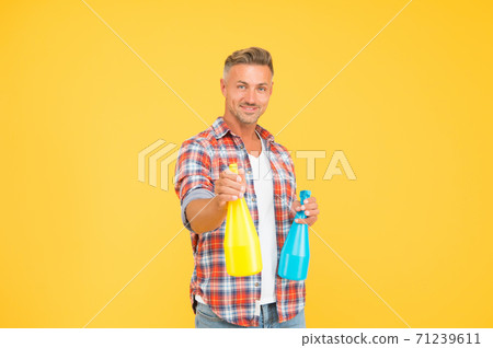 Man spray disinfectant liquid around himself, antibacterial concept Man spray disinfectant liquid around himself, antibacterial concept 71239611