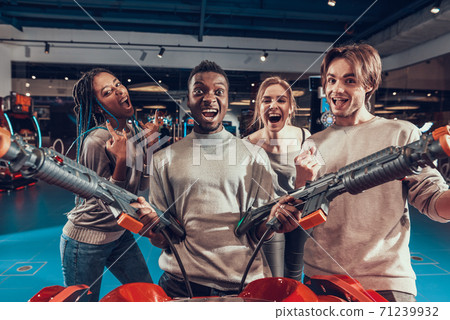 An African American man stands with a gun. An African American man stands with a gun. 71239932