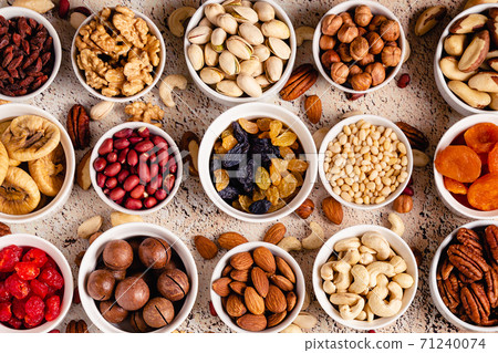 Nuts and dried fruits assortment. Nuts and dried fruits assortment. 71240074