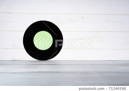 Vinyl record on white wooden background Vinyl record on white wooden background 71240598