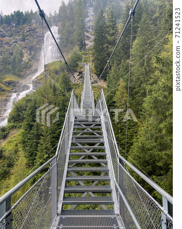 Stuibenfall is dramatic cascade falling 159 meters, Austria. 71241523