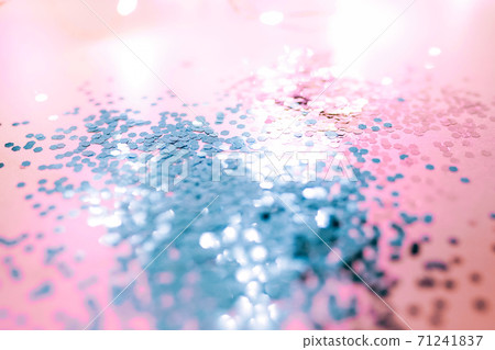 Pink and blue sparkles and lights on the pink background. Pink and blue sparkles and lights on the pink background. 71241837