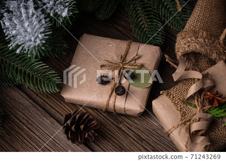 Christmas gift boxes in craft paper Christmas gift boxes in craft paper 71243269