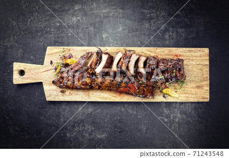 Barbecue spare ribs St Louis style with hot honey chili marinade 71243548