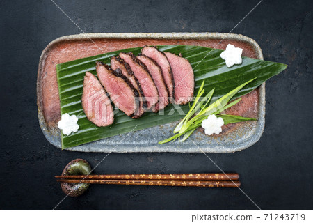 dry aged fillet steak sliced with daikon and leek 71243719