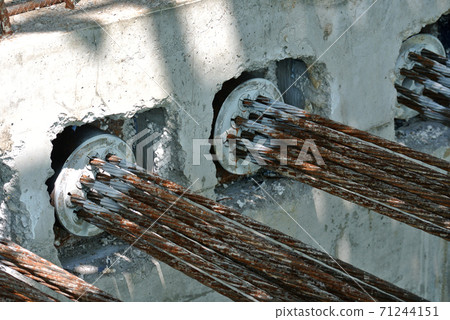 JOHOR, MALAYSIA -APRIL 14, 2017: Pre-stress cable tendons anchor end for pre-stressed concrete at the construction site. It is a technology to get better concrete slab quality with larger span.   71244151