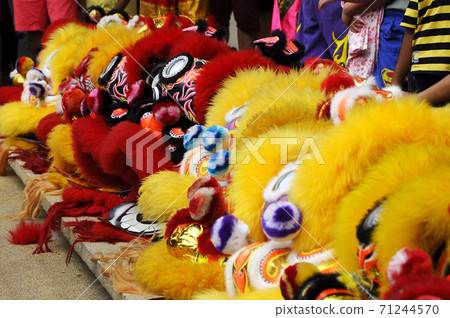 SEREMBAN, MALAYSIA -FEBRUARY 2, 2017: Chinese lion mask or lion head used to performed lion dance during Chinese New Year Festival at Seremban, Malaysia. Beautiful & colourful.  71244570
