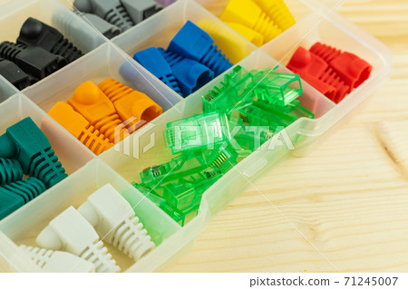 cap rj 45 set red, green and blue lies in the boxing boxes of an engineer tool cap rj 45 set red, green and blue lies in the boxing boxes of an engineer tool 71245007