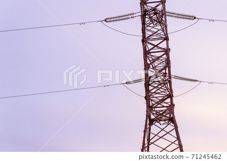 high-voltage steel tower with wires transmission of electric current against the sky high-voltage steel tower with wires transmission of electric current against the sky 71245462