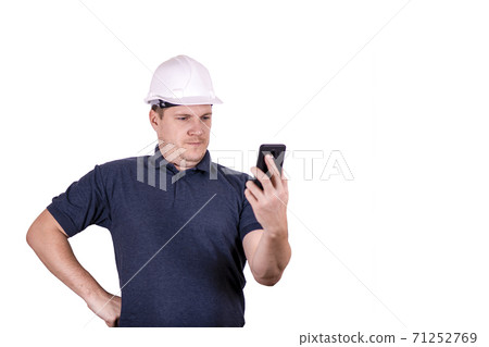 white male engineer in a white hard hat 71252769