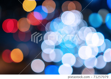 Abstract car lights bokeh traffic on street. Blur of night lights bokeh on the road. Abstract car lights bokeh traffic on street. Blur of night lights bokeh on the road. 71257079