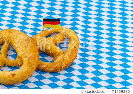 two pretzels decorated with the flag of Germany 71259280