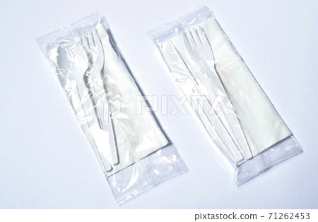 plastic spoon and forkwith knife for single used in package on white background plastic spoon and forkwith knife for single used in package on white background 71262453
