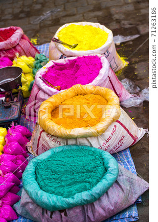 Bags of colored powdered paint sit waiting to be sold to Holi Festival celebrants 71263186