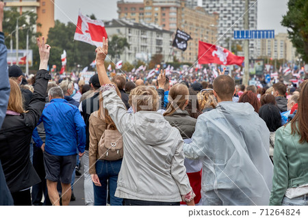 Peaceful demonstration against the illegal President, when people raised their hands Peaceful demonstration against the illegal President, when people raised their hands 71264824