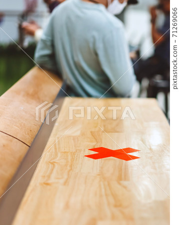 Alternative seating mark for social distance rules in the mall distance for one seat from other people to protect from Corona Virus(COVID-19), social distancing for infection risk.New normal lifestyle Alternative seating mark for social distance rules in the mall distance for one seat from other people to protect from Corona Virus(COVID-19), social distancing for infection risk.New normal lifestyle 71269066