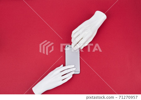 Mannequin hands and smartphone. 71270957