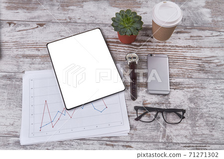 Top view business stuff on a wooden table. Top view business stuff on a wooden table. 71271302