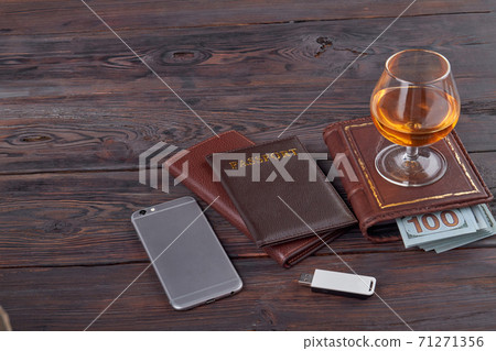 Businessman accessories on brown wooden table. Businessman accessories on brown wooden table. 71271356