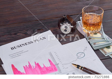 Business stuff on wooden table. 71271866