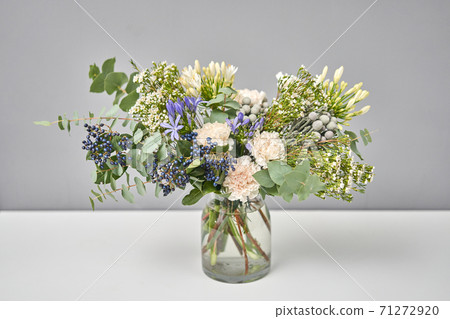 Bouquet 009. Finished flower arrangement in a vase for home. Flowers bunch, set for interior. Fresh cut flowers for decoration home. European floral shop. Delivery fresh cut flower. 71272920