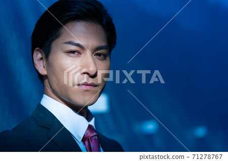 Portrait up of a man in a young suit Portrait up of a man in a young suit 71278767