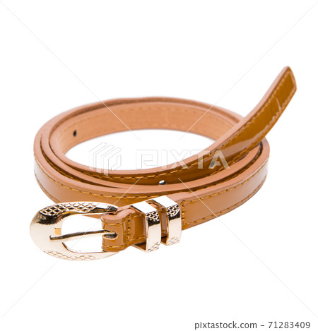 narrow brown female belt with a gold buckle, laid in a ring, on a white background 71283409