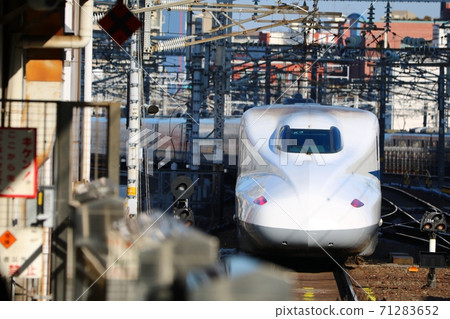 Shinkansen departing from the station Shinkansen departing from the station 71283652